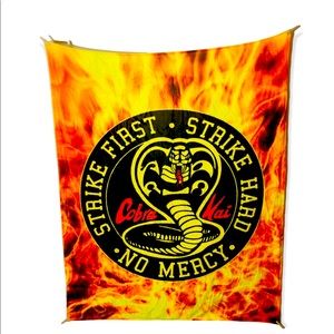 Cobra Kai First Strike Hard No Mercy Throw Blanket
Soft Fleece
